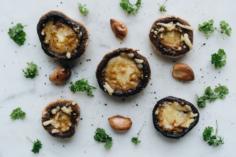 Stuffed mushroom caps filled with cheese and herbs