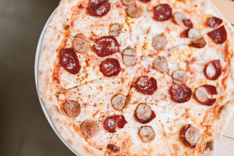 BBQ Smokehouse pizza with pulled pork and caramelized onions